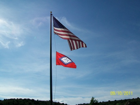 U.S. and Arkansas flags flying from the same pole. Photo from Mountain Meadows Massacre Descendants.